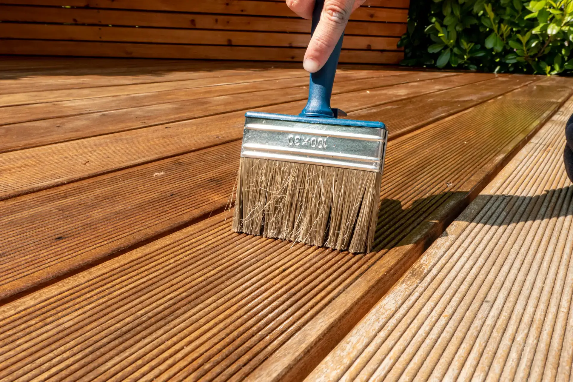 How long does deck stain take to dry